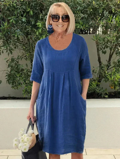 Stylisches Atmungsaktives Frauenkleid Mit Tasche | Midi