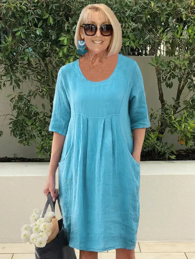 Stylisches Atmungsaktives Frauenkleid Mit Tasche | Midi