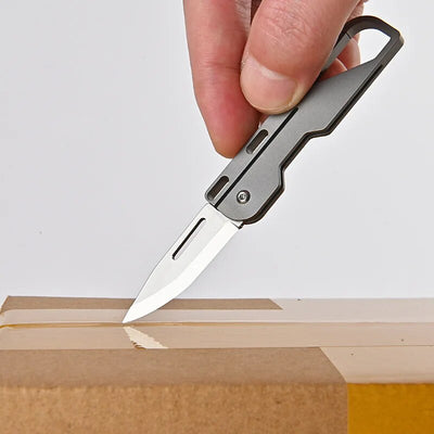 Kompakt und mächtig: MGS Titanlegierung MINI Klappmesser mit hochfester D2-Klinge – Ein Schlüsselanhänger-Pendeln Taschenmesser für Outdoor EDC und Selbstverteidigung