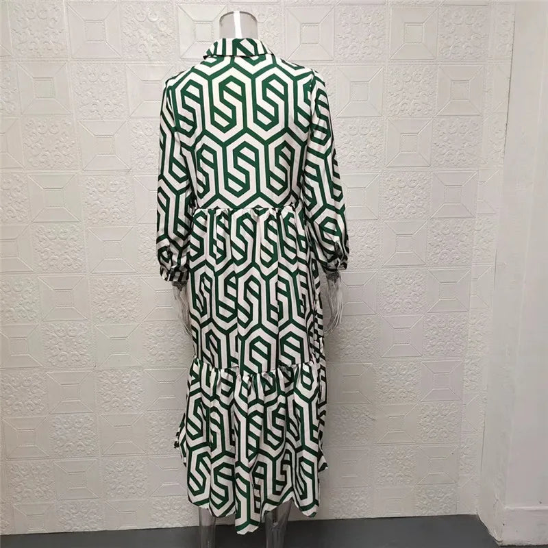 Damenkleid Mit V Ausschnitt Und Geometrischem Muster | Midi