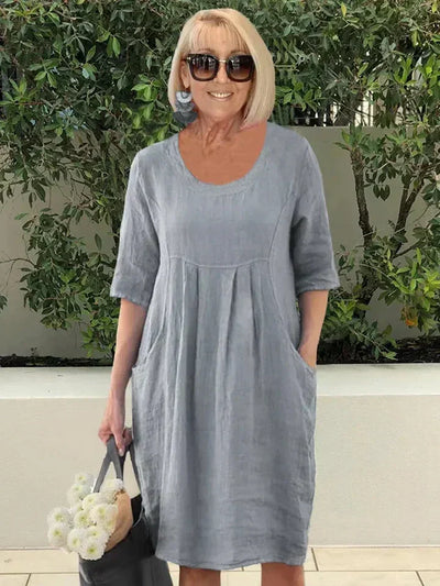Stylisches Atmungsaktives Frauenkleid Mit Tasche | Midi
