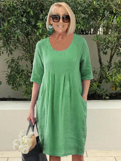 Stylisches Atmungsaktives Frauenkleid Mit Tasche | Midi
